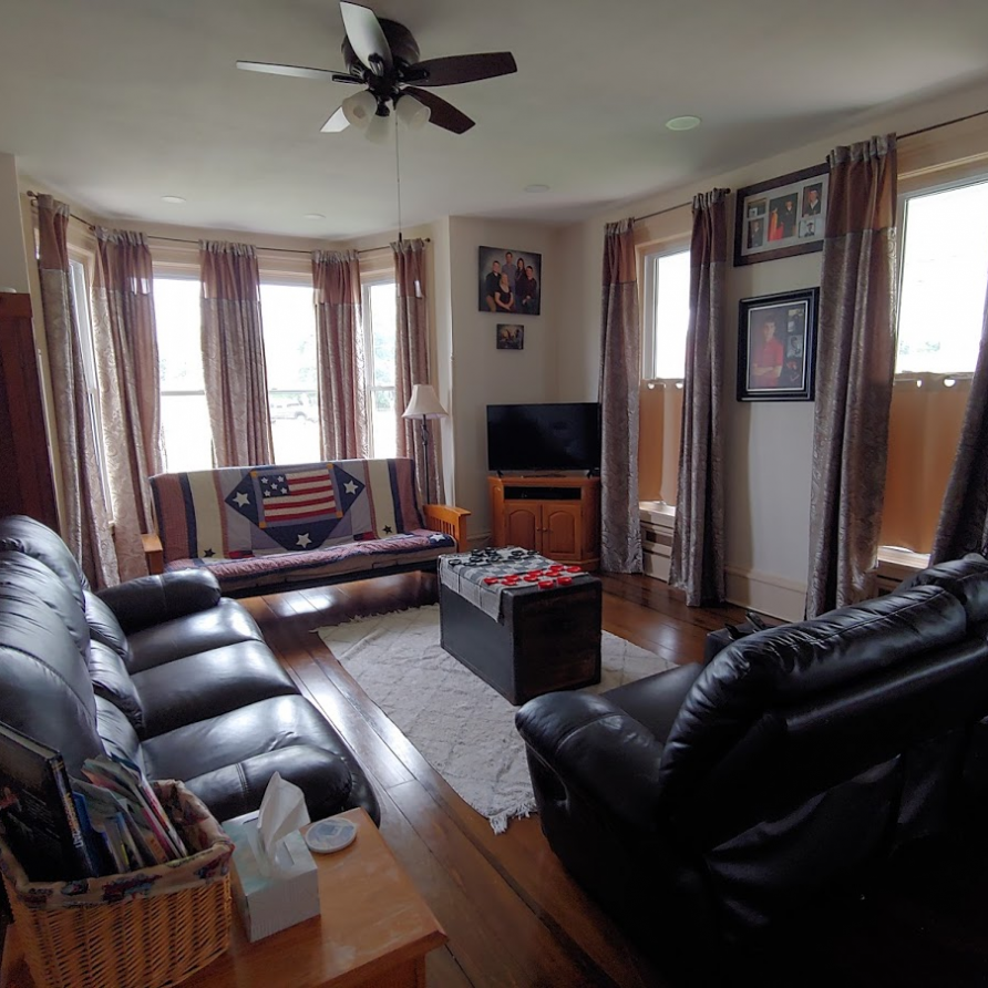 This is the shared living area with plenty of seating for watching Tv